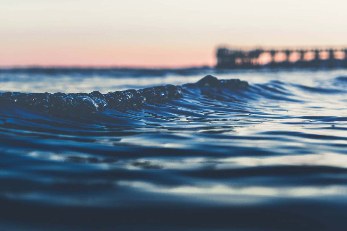 united states shallow focus photography of sea wave milford